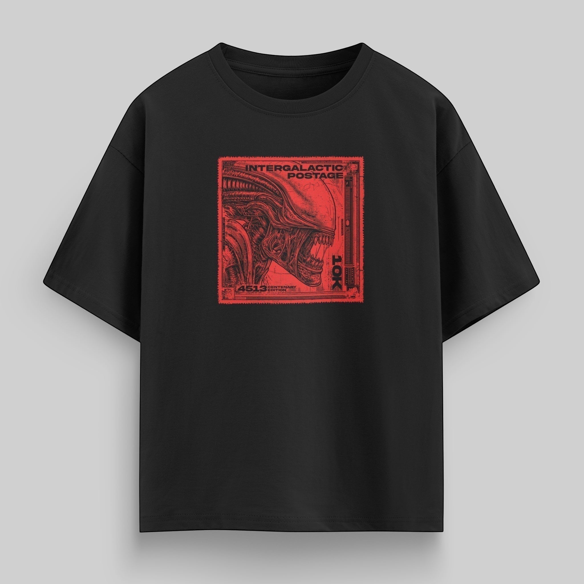 vvicked black oversized cotton t-shirt featuring a red alien stamp graphic on the chest with drop-shoulder fit